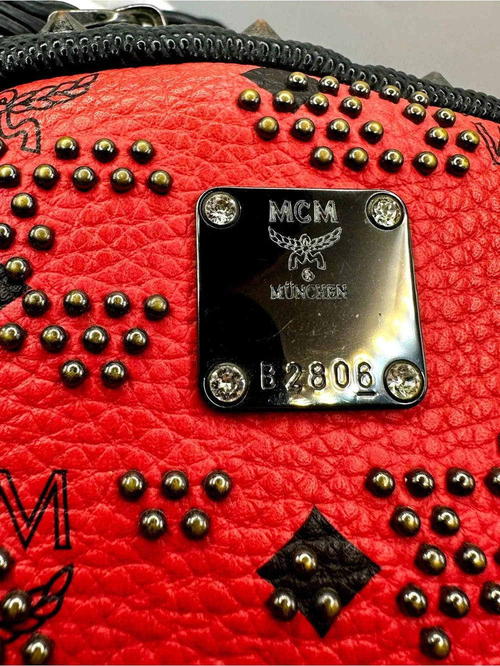 MCM Stark Red Leather Studded Backpack with Black Trim